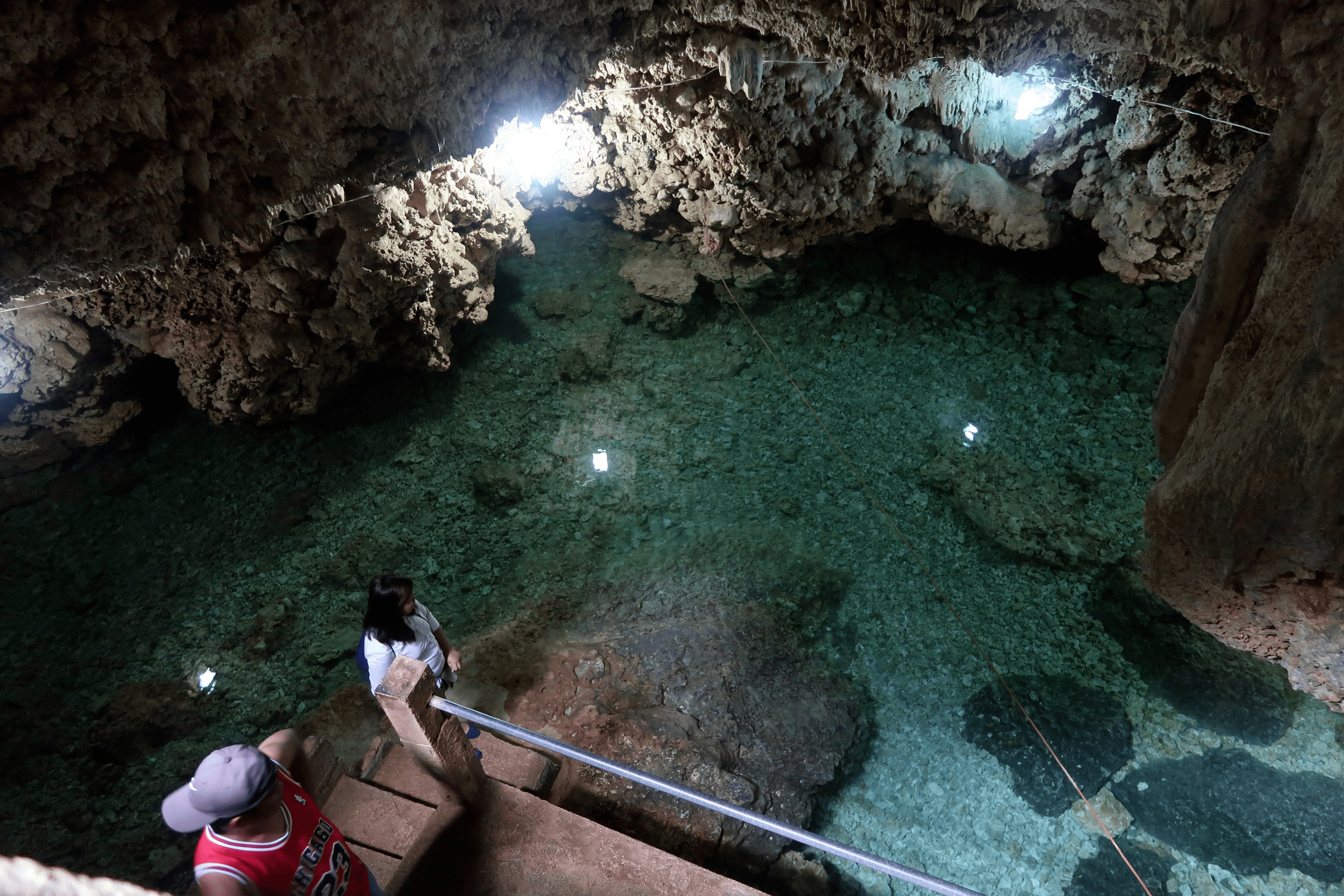 melody somido girl and boy filipino inside wonderful cave in bolinao pangasinan philippines